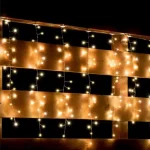 Legkelendőbb Home MLF 300/WW micro LED-es cluster fényfüggöny, 3x0,5 m / 300 db melegfehér micro LED, 8 fényprogram, távirányító, hálózati adapter, kül- és beltéri kivitel MLF 300/WW