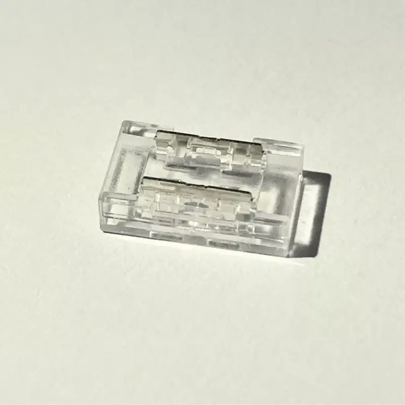 Gyorscsatlakozó , 8 mm-es DOTLESS COB LED szalaghoz , 2 pólusos , szalag-szalag toldáshoz ,IP20/IP65 , MULTI SNAP Végkiárusítás